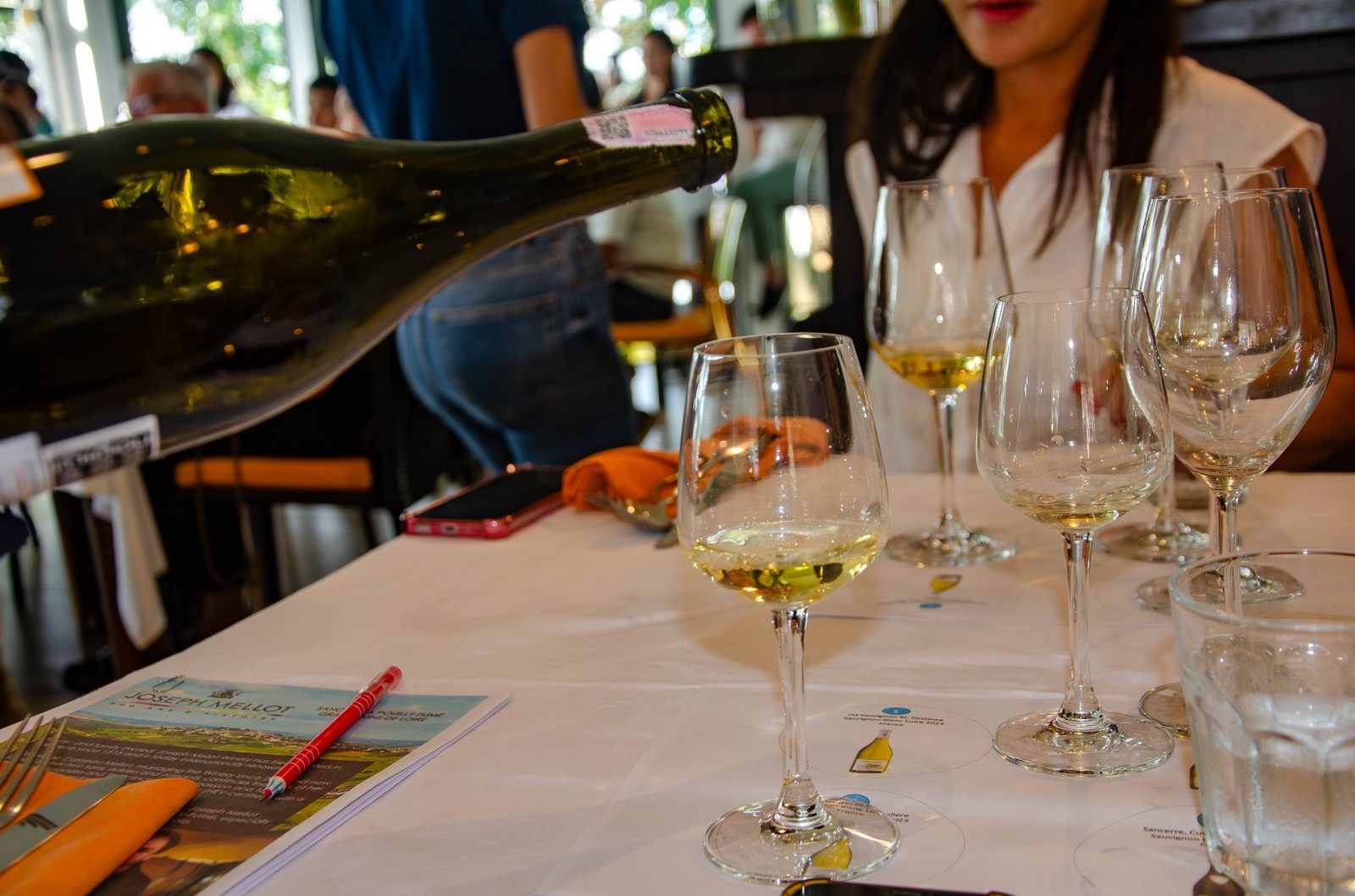 Wine being poured at Pizza on Fire